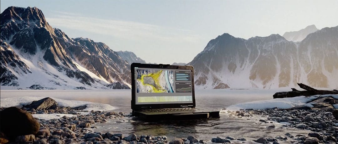 Rugged Dell laptop in an industrial environment, showcasing its durability and reliability for extreme business conditions.